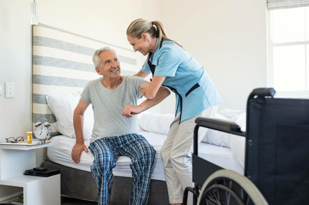 Caring nurse supporting patient